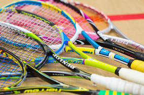 An image of squash rackets on the Squash Revolution courts