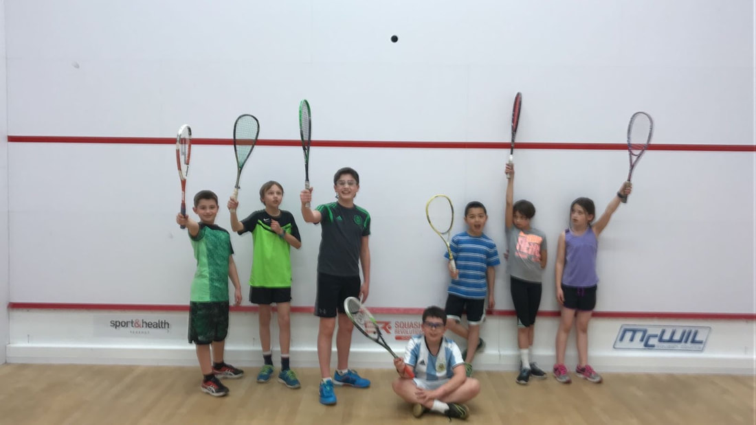 Squash school players on the squash court in DC 