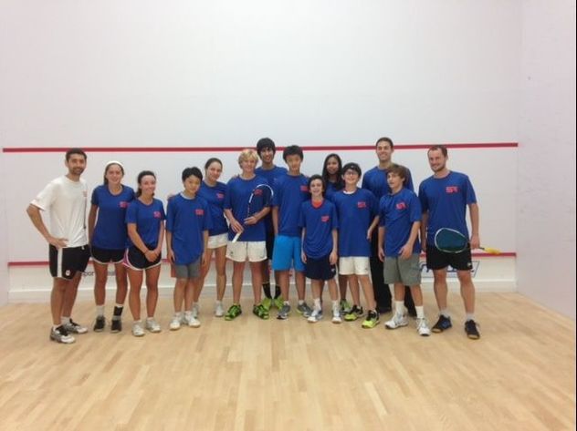 Photo of squash players on a squash court at Squash Revolution 