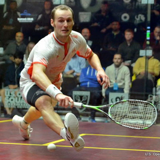 Greg Gaultier plays in a squash tournament