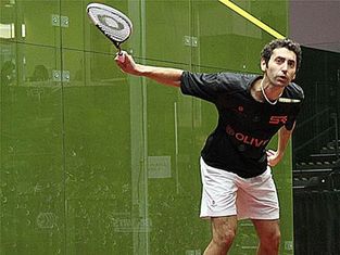 Photo of Shahier Razik at a squash sport tournament in DC