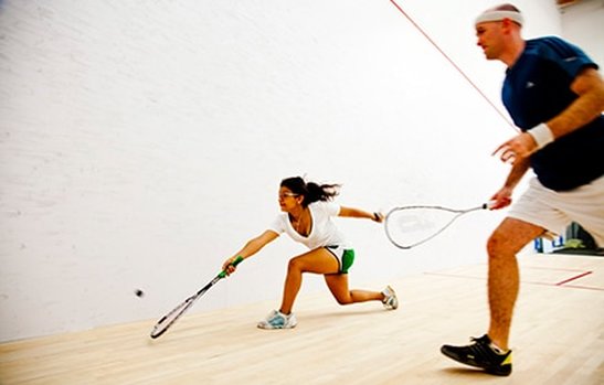Pictures of people playing squash with squash revolution in Washington dc