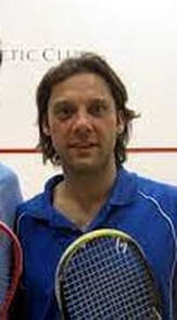 Photo of squash coach Ned Sparrow playing the sport on the squash club in Baltimore