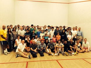 A large group of squash players at a Squash Revolution program